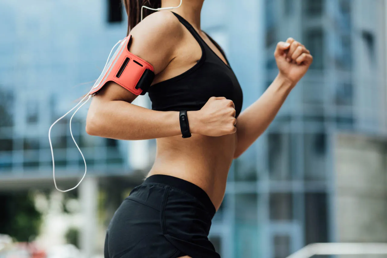 side view woman running scaled 1